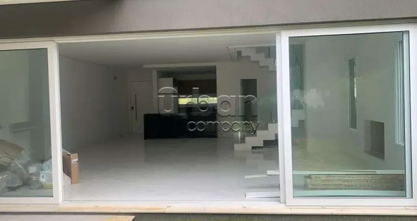 Casa em condomínio fechado com 3 quartos à venda na Rua Doutor Ney de Castilhos Ferreira, 300, Pedra Redonda, Porto Alegre