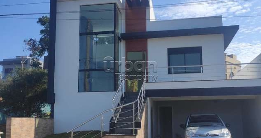 Casa em condomínio fechado com 3 quartos à venda na Rua Antônio Ramos, 440, Loteamento Jardim Timbaúva, Gravataí