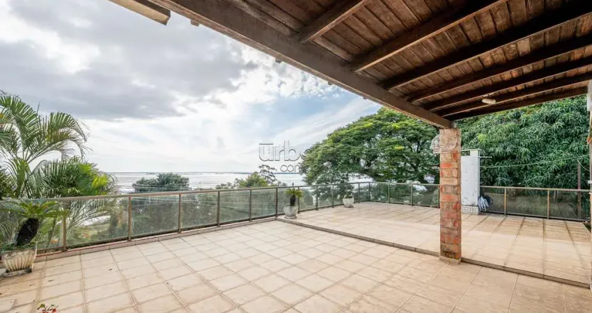 Casa em condomínio fechado com 4 quartos à venda na Avenida Pinheiro Borda, 148, Cristal, Porto Alegre