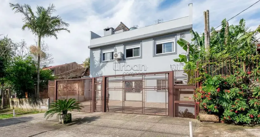 Casa em condomínio fechado com 4 quartos à venda na Avenida José Gertum, 544, Chácara das Pedras, Porto Alegre