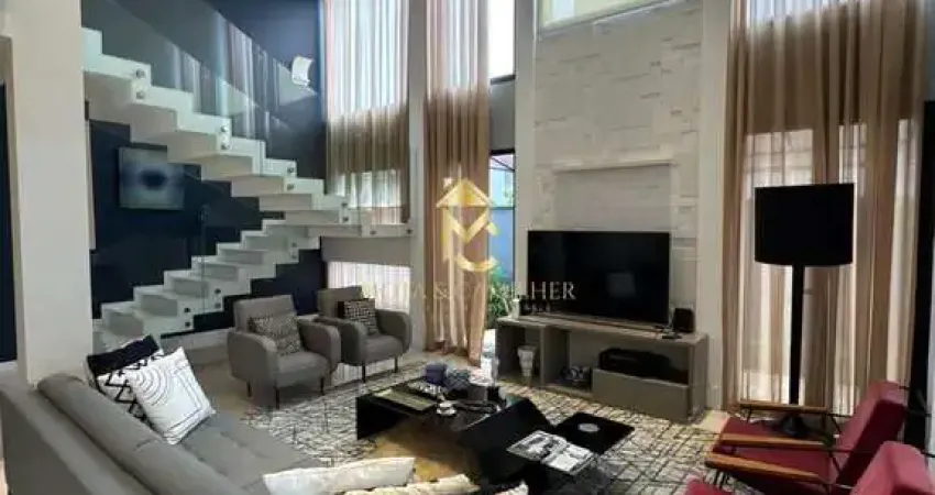 Casa com piscina e varanda gourmet à venda em condomínio de alto padrão.