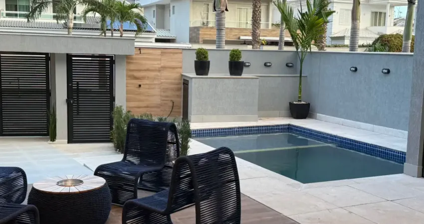 Alugo casa de alto padrão mobiliada no riviera del sol com 4 suítes