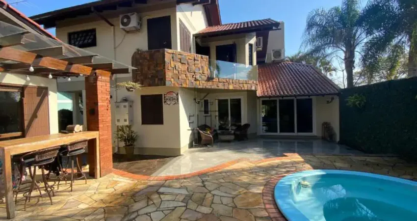 Casa à venda em São Leopoldo, Bairro Pinheiro - Com Sacada, Churrasqueira e Piscina