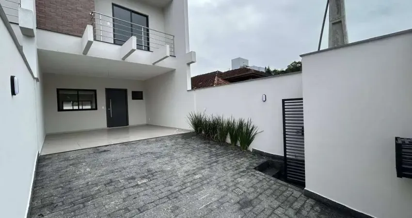Sobrado com 1 suíte + 2  dormitórios à venda, 143 m² por R$ 875.000 - Costa e Silva - Joinville/SC
