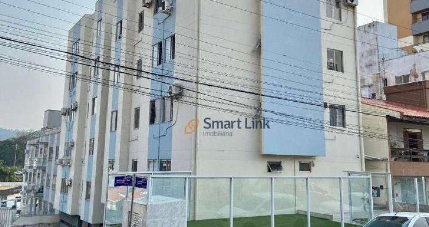 Apartamento com 2 dormitórios à venda, 58 m² por R$ 310.000,00 - Barreiros - São José/SC