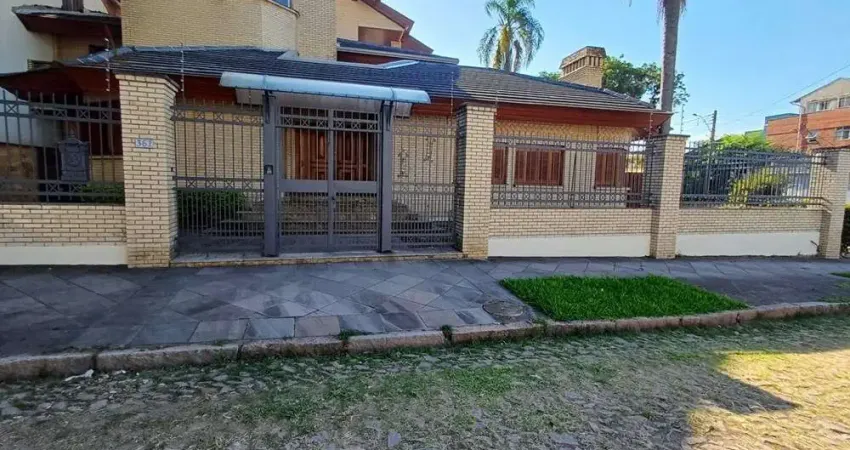 Casa com 4 quartos à venda na Rua Paissandu, 361, Partenon, Porto Alegre