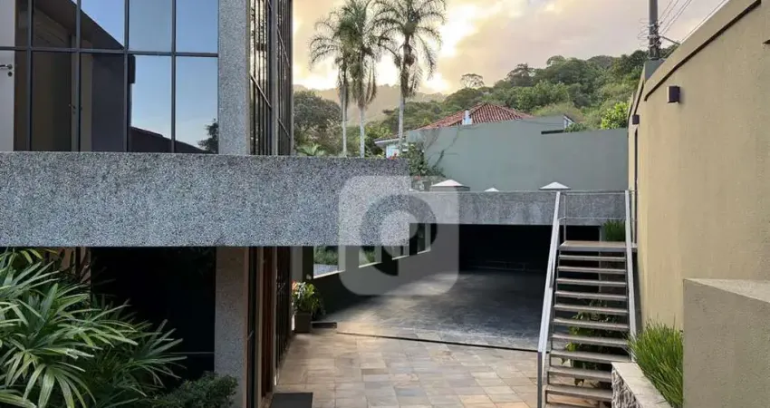 Mansão de luxo com vista para o mar e morro dois irmãos na gávea.