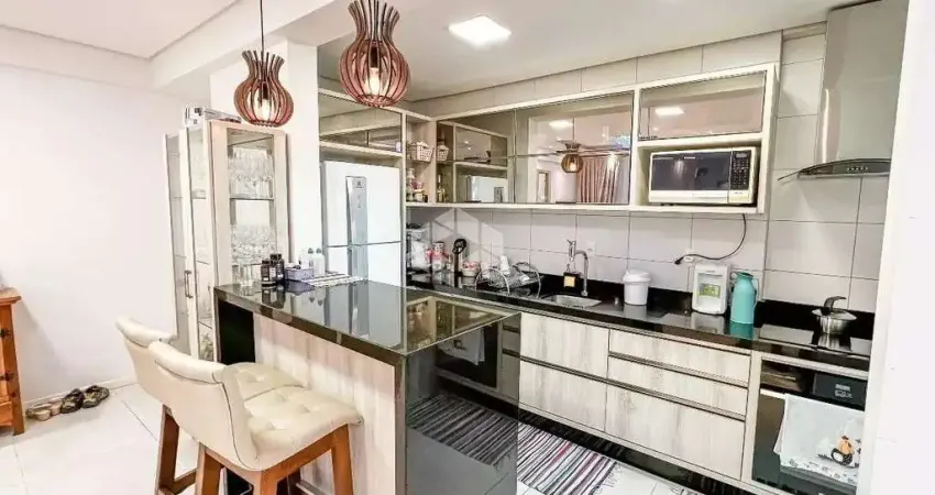 Apartamento com três dormitórios em Barreiros