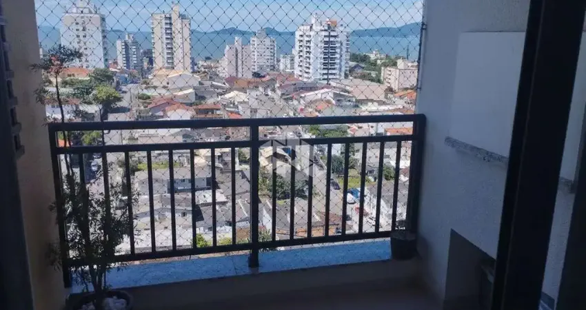 Apartamento com 2 dormitórios sendo uma suíte em barreiros - são josé/sc