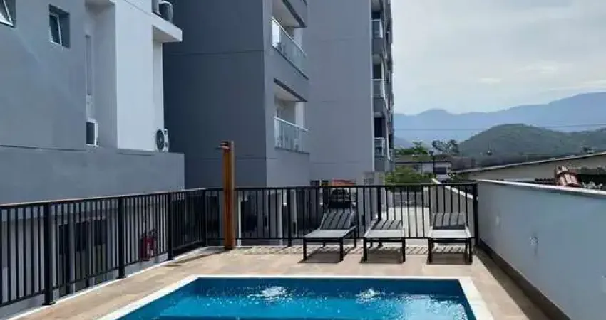 Ubatuba, centro, apartamento com 02 dormitórios sendo 01 suíte com área de lazer.