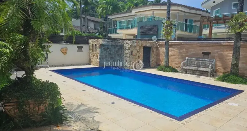 Casa em condomínio fechado com 3 quartos para alugar no Balneário Praia do Pernambuco, Guarujá 
