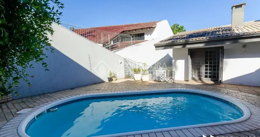 Casa com 3 quartos à venda na Rua Gustavo Schmidt, 20, Três Figueiras, Porto Alegre