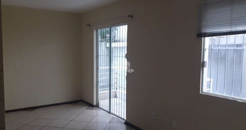 Kitnet  com sacada à venda no bairro Centro, em Santa Maria, RS.