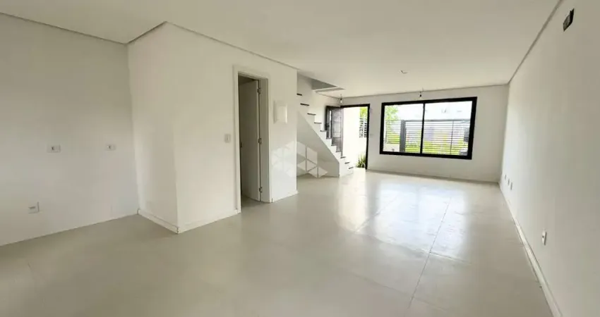 Casa 3 dormitórios,1 suíte com sacada, living 2 ambientes, churrasqueira, no Bairro Igara, na cidade de Canoas. Aceita Financiamento bancário e FGTS