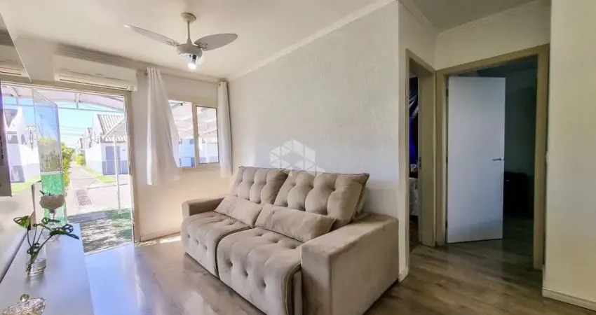 Casa em condomínio fechado no Bairro São Luís/Canoas ? 2 dormitórios, 2 vaga de garagem coberta, aceita financiamento bancário e FGTS