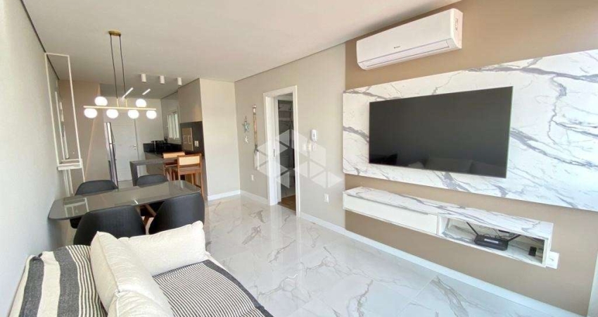 Apartamento com 2 dormitórios/quartos e 1box/vaga no bairro Navegantes em Capão da Canoa/RS