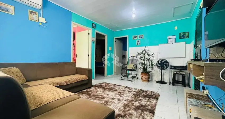 Casa com 02 dormitórios e vaga de garagem no Bairro Diácono Luiz Pozzobon em Santa Maria