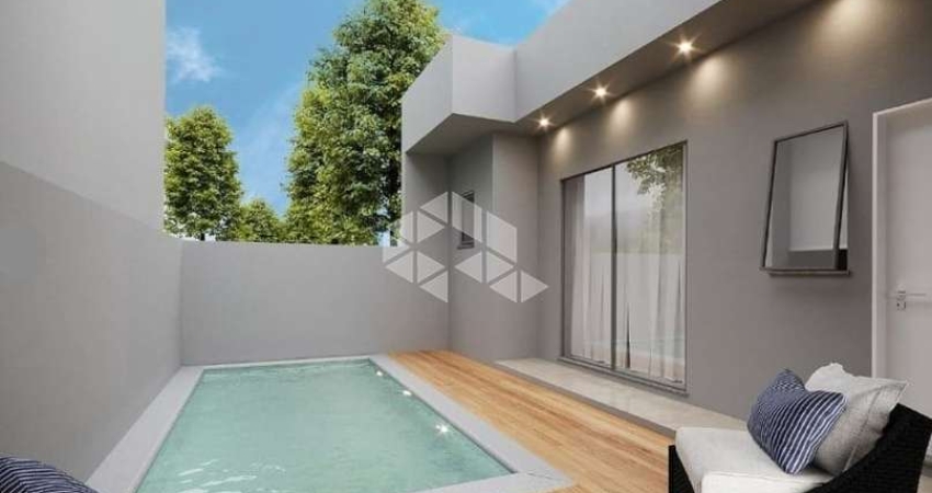Casa de 2 dormitórios, sendo 1 suíte, garagem coberta, espaço social com piscina . Bairro Bela Vista em Estancia Velha.  Aceita Financiamento e FGTS!