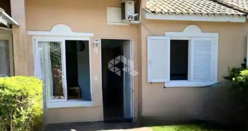 Casa dois dormitórios em condomínio Rio Branco Canoas