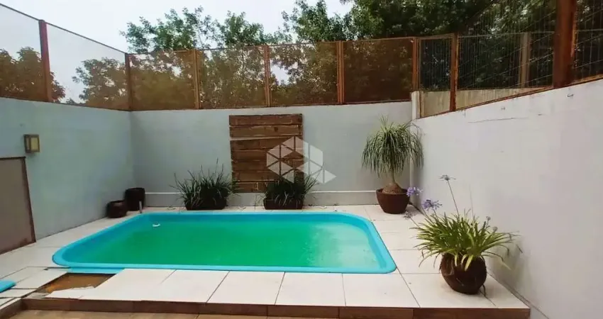 Casa com 3 quartos à venda na Rua Professor Henrique Desjardins, 154, Espírito Santo, Porto Alegre