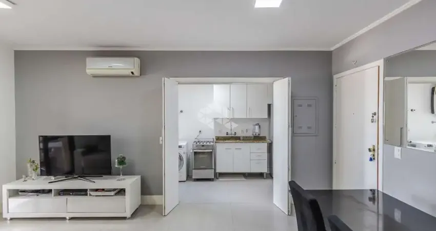 2 dormitórios, suíte, churrasqueira e 2 vagas na Av. Nilo Peçanha!