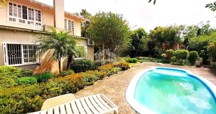 Casa com 4 quartos à venda na Luiz Feula, 66, Lami, Porto Alegre