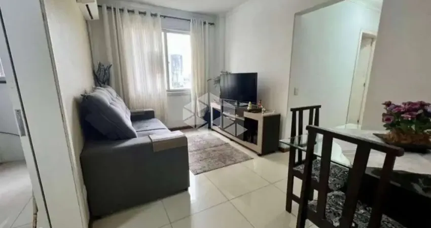 Apartamento semi mobiliado 2 dormitorio e vaga escriturada a venda no bairro partenon.