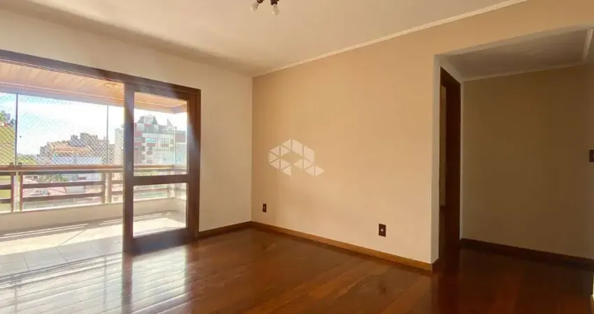 Apartamento 03 quartos com suíte, sacada integrada com churrasqueira em rua tranquila.