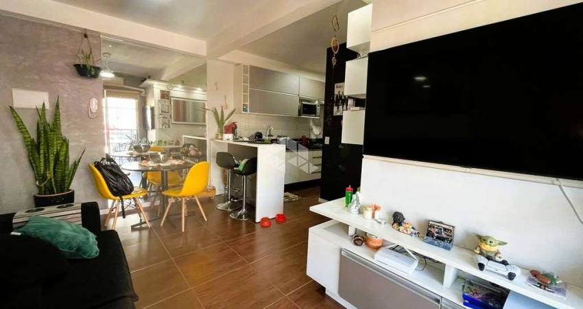 Apartamento térreo a venda com 55 m²,  semi-mobiliado, 2 dormitórios, churrasqueira e 1 vaga na Cavalhada
