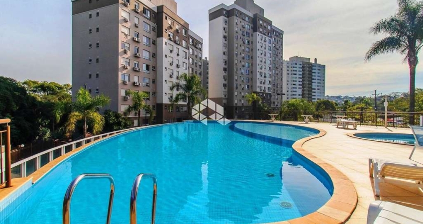 APARTAMENTO MOBILIADO À VENDA NO CONDOMÍNIO ROSSI CARIBE, COM 2 DORMITÓRIOS, 1 SUÍTE, CHURRASQUEIRA E VAGA PARA 2 VEÍCULOS