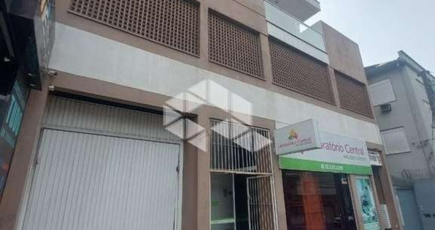 Apartamento 02 dormitórios com garagem a venda no Centro