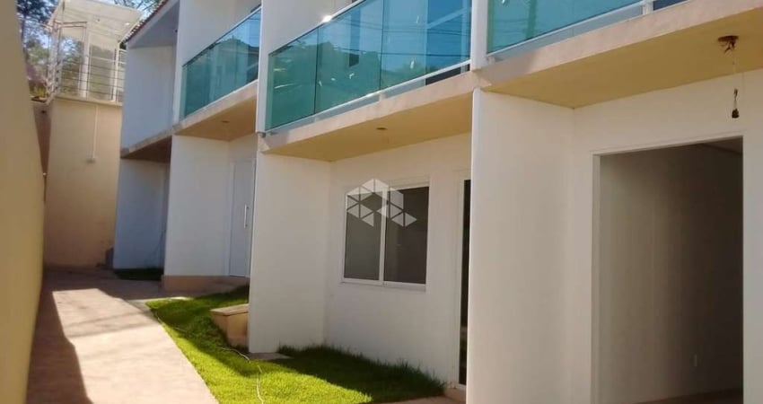 Casa em condomínio fechado com 2 quartos à venda na Rua Sargento Marcos Henrique T Ferreira, 396, Tarumã, Viamão