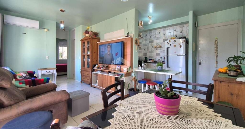 Apartamento de 2 dormitórios e 1 vaga de garagem, no bairro Humaitá, em Porto Alegre.