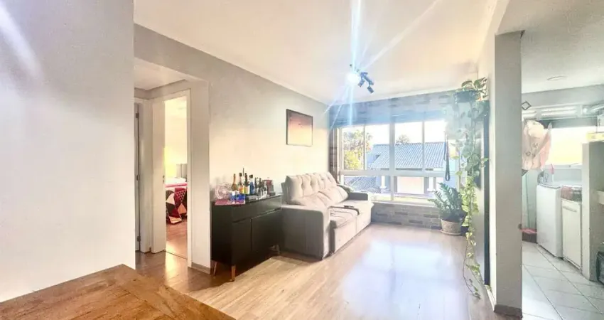 Apartamento com dois quartos, suíte e churrasqueira, no Jd São Pedro