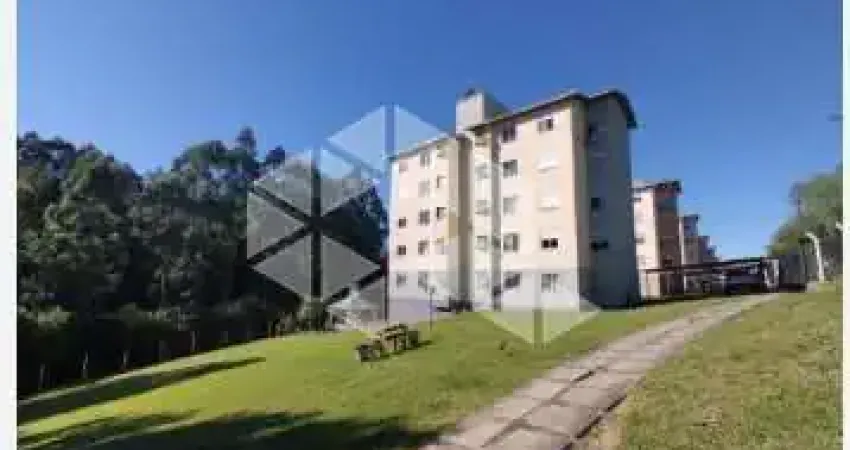 Apartamento terreio no cinquentenário, com dois quartos.