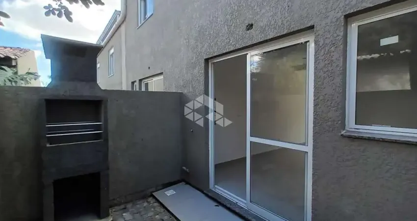 Casa em condomínio fechado com 2 quartos à venda na Rua Miguel Ascoleze, 125, Vila Nova, Porto Alegre