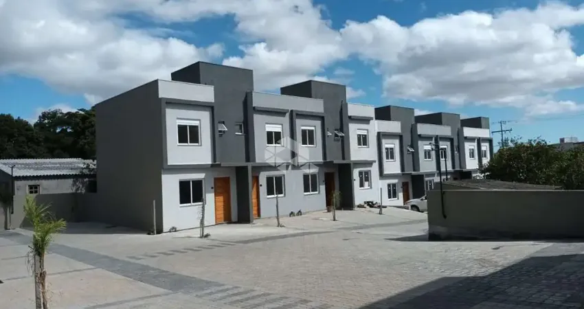 Sobrado em condomínio fechado com 2 quartos e pátio com churrasqueira - vila nova