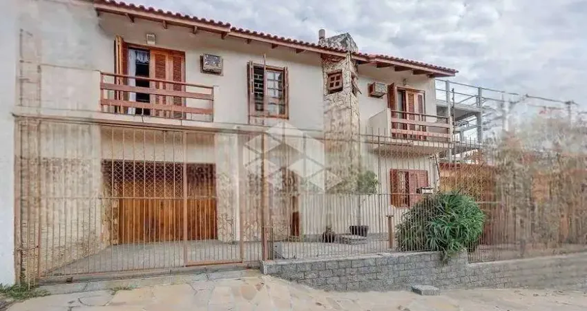 Casa estilo sobrado 4 dormitórios suíte closet sacada no bairro cavalhada zona sul de poa/rs.