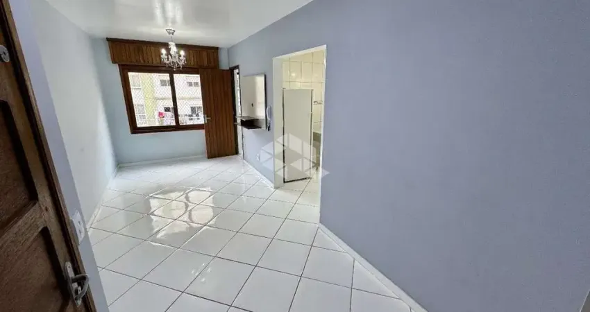 Apartamento de 2 dormitórios sendo 1 suíte e box de garagem no centro de capão da canoa