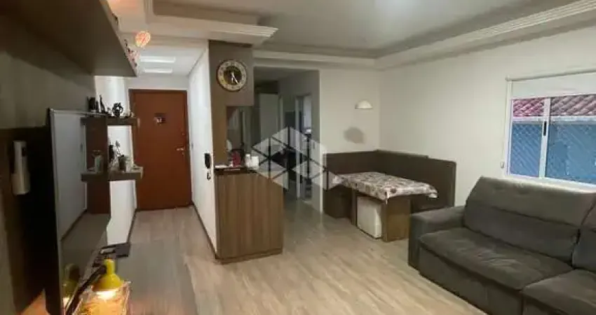 Apartamento semi-mobiliado à venda no pagani - palhoça/sc com 2 dormitórios, suíte e sacada com churrasqueira