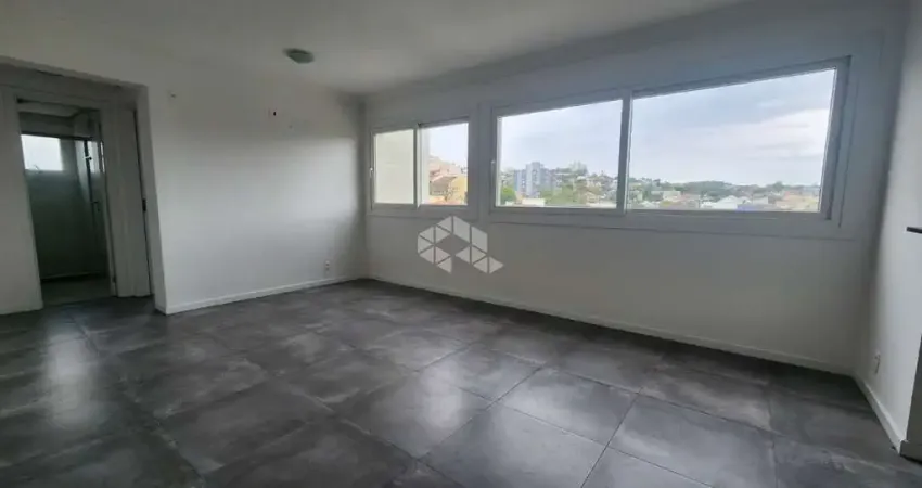 Apartamento de 1 dormitório com 1 vagas escriturada e churrasqueira