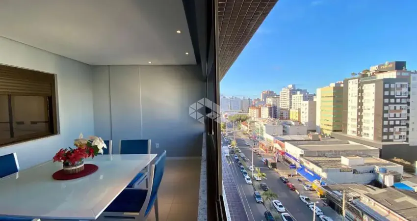 Apartamendo de 2 dormitórios sendo 1 suíte com sacada de frente frente, churrasqueira no centro de capão da canoa