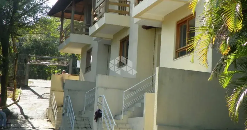 Casa em condomínio fechado com 3 quartos à venda na Avenida Vicente Monteggia, 1669, Cavalhada, Porto Alegre