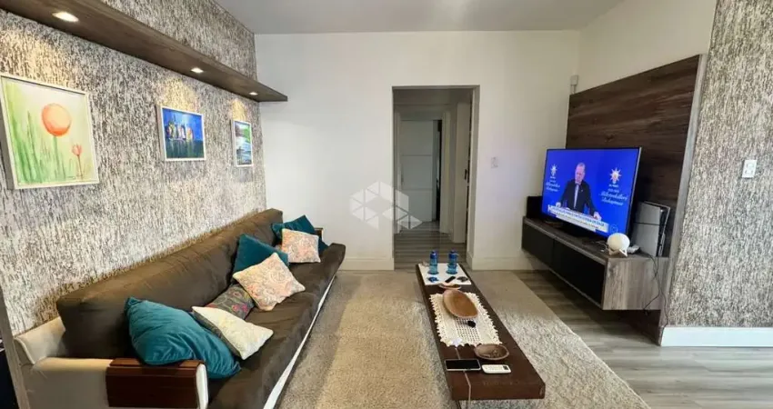 Apartamento semimobiliado com 2 quartos e sacada no canto em florianópolis pronto para morar