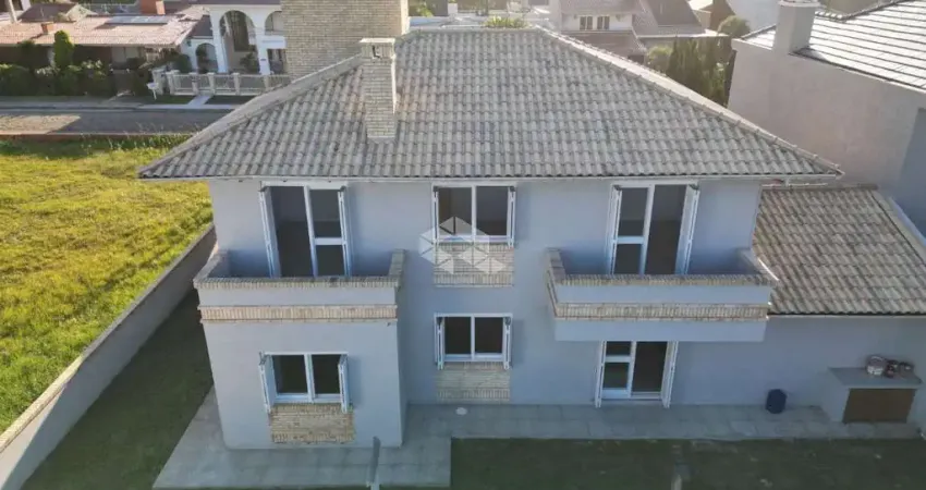 Sobrado à venda com 5 quartos/dormitórios e 2 vagas /box em atlântida xangri-lá/rs