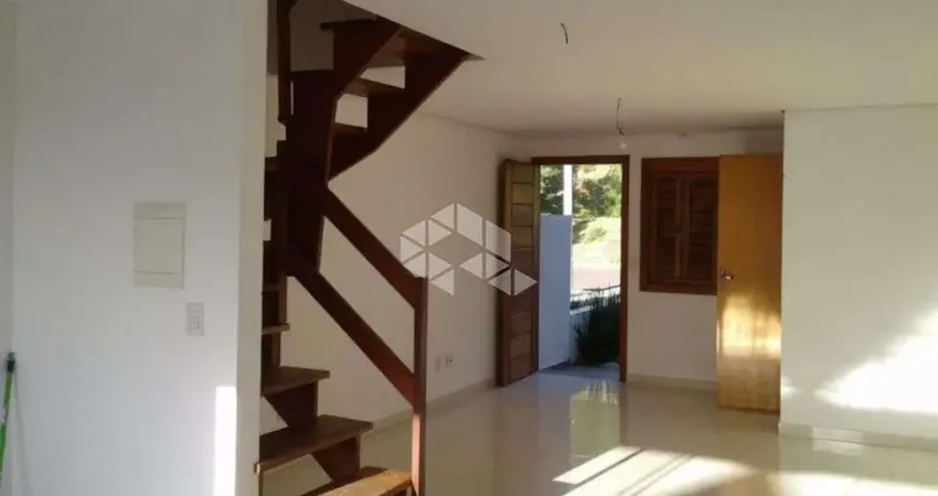 Casa com 3 quartos à venda na Rua Henrique Anawate, 484, Guarujá, Porto Alegre