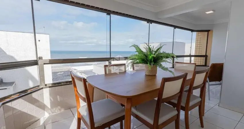 Apartamento com 2 dormitórios/quartos sendo 1 suíte mobiliado com vista mar e vaga de garagem no centro de capão da canoa!