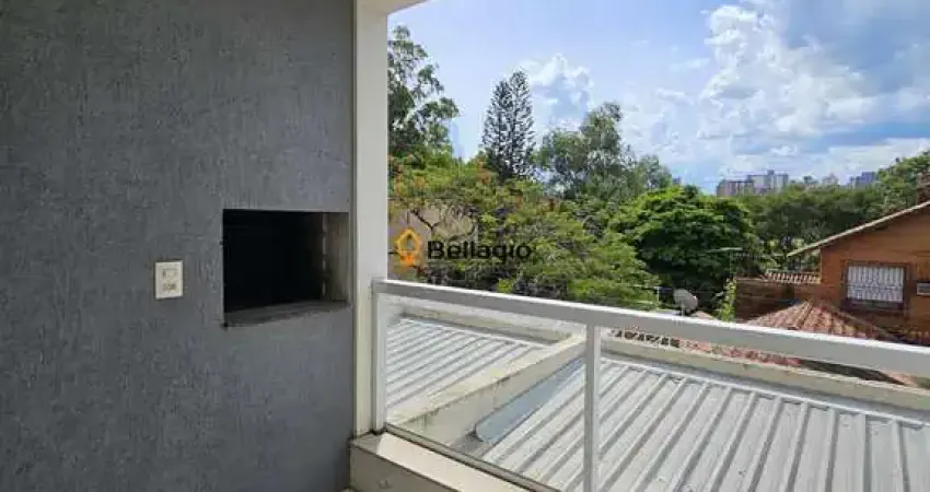 Apartamento semimobiliado para locação – 2 dormitórios, suíte, sacada e garagem!