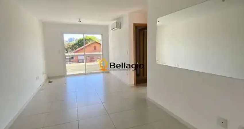 Apartamento semimobiliado para locação – 2 dormitórios, suíte, sacada e garagem!