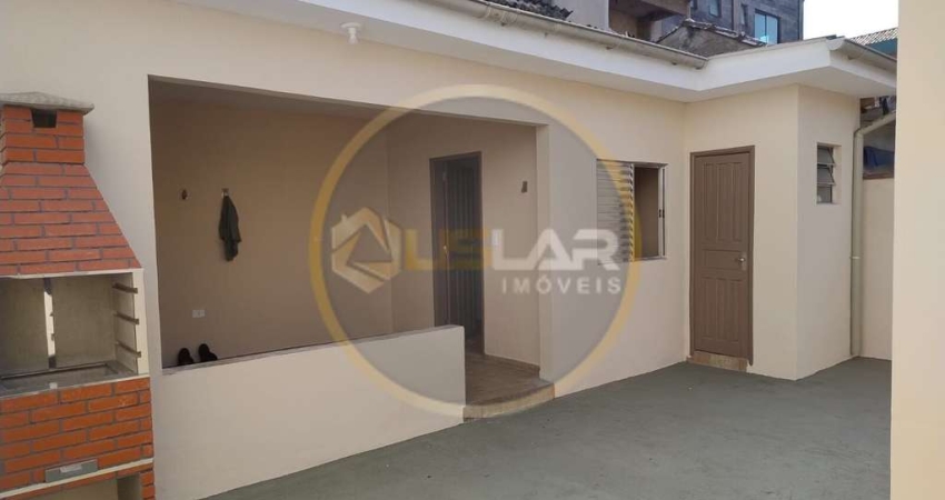 Casa térrea com edícula na ponta da praia em Santos